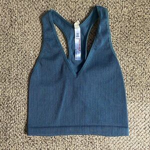 This is a blue cropped tank from Free People Movement.